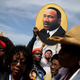 A picture of Martin Luther King Jr. is held up before marchers walk across the Edmund Pettus Bridge in Selma, Ala., March 8, 2015, during the 50th anniversary commemoration of the Selma to Montgomery civil rights march.
Justin Sullivan/Getty Images